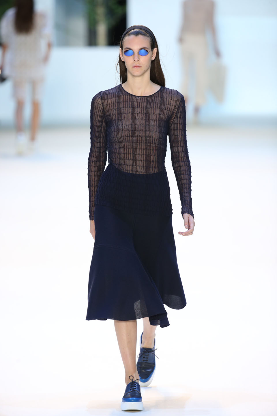 Vittoria Ceretti (Elite) Aquamarine cotton knit pullover, techno mesh A-line skirt